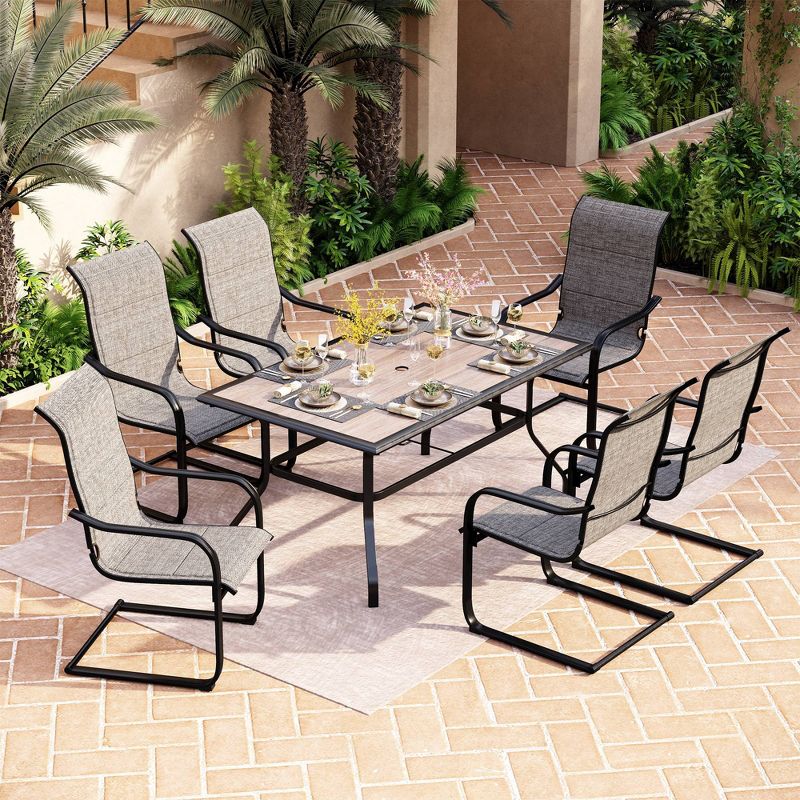 Metal Patio Dining Set with 60&#34;x37&#34; Table with Umbrella Hole &#38; 6 Sling Motion Chairs - Captiva Designs, 1 of 10