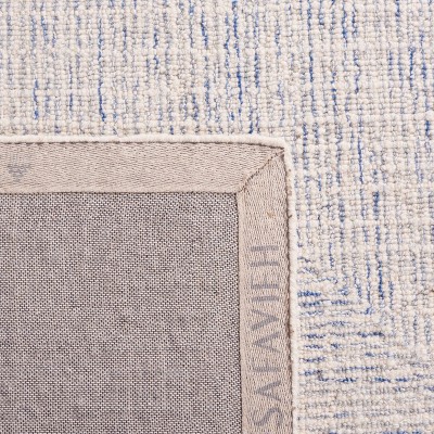 Handmade Blue and Ivory Wool Abstract 8' x 10' Area Rug