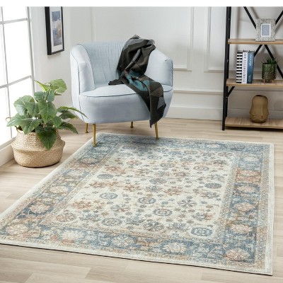Ivory and Blue Floral Synthetic 5' x 7' Area Rug