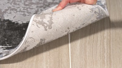 Swirling Greyscale Abstract 59" Round Synthetic Area Rug