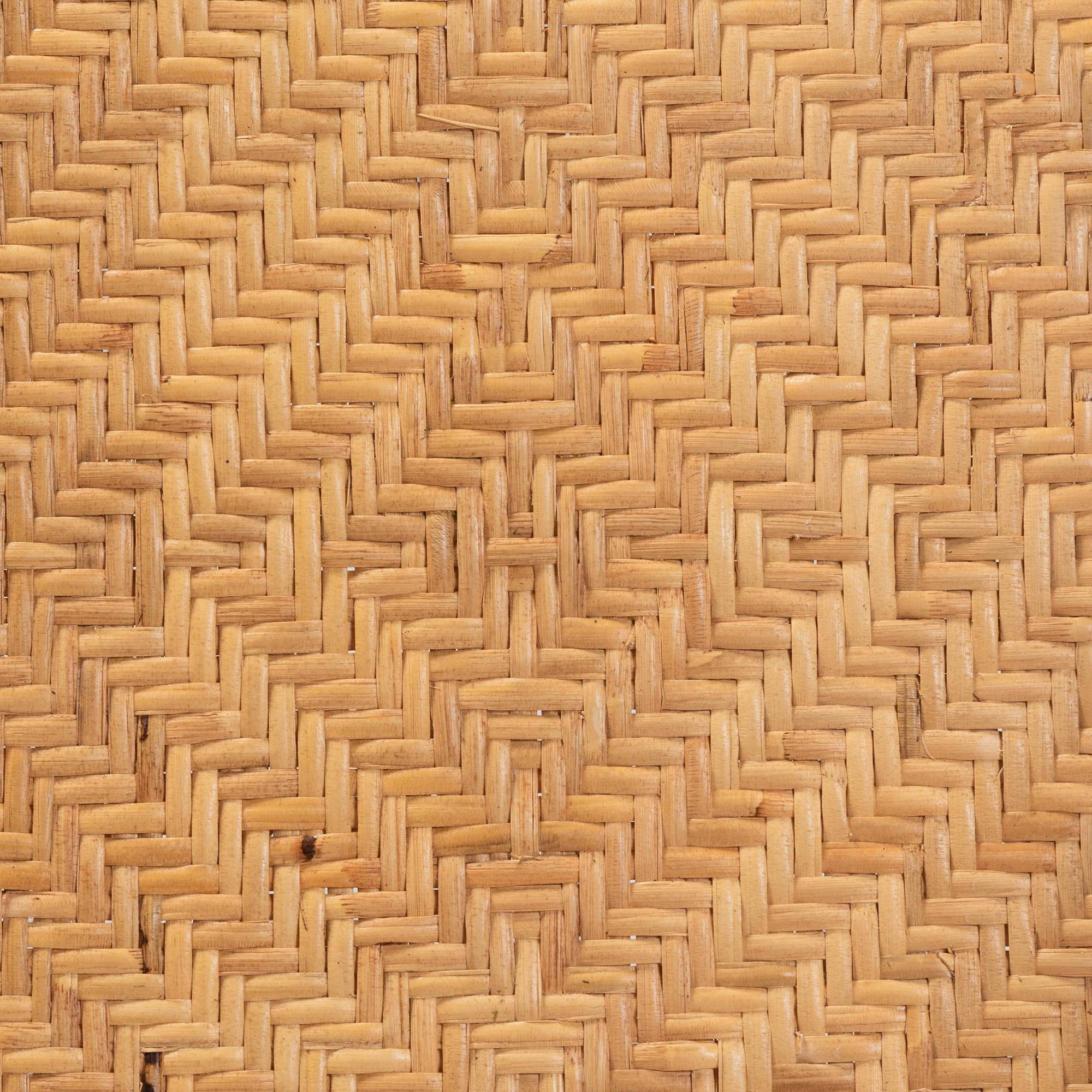 Close-up texture of the woven rattan pattern on the barstool seat.