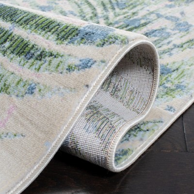 Blue and Green Floral Synthetic Area Rug 5'3" x 7'7"