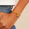 Free bird Cross Birthstone Bracelet | Dainty 14K Gold Plated Cross Charm Bracelet | Stretchable Elastic Gold Beaded Bracelet - 4 of 4