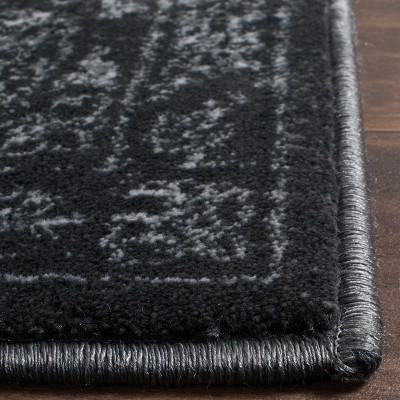 Carnegie 6'7" x 9'2" Dark Gray Synthetic Area Rug