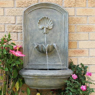 Seaside French Limestone Solar-Powered Wall Fountain with Battery Backup