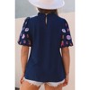 Amaryllis Women's Textured Puff Sleeve Top with Embroidered Details Elegant Relaxed Fit Chic Blouse - 4 of 4