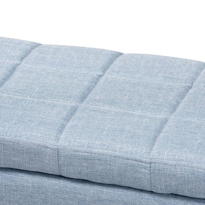Light Blue Tufted Fabric Storage Ottoman with Black Wood Feet