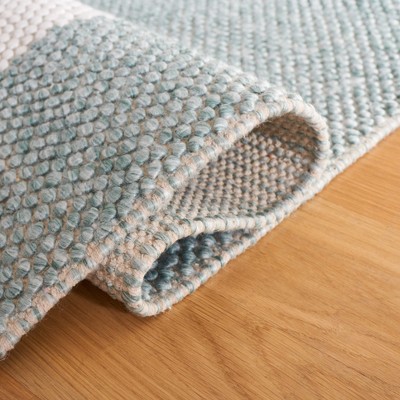 Turquoise and Ivory Striped Wool 4' x 6' Area Rug