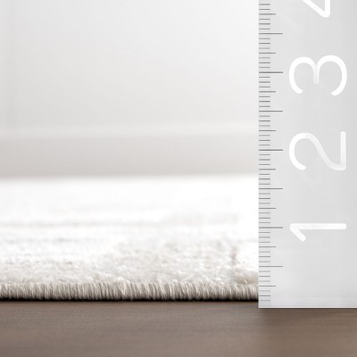 Ivory Geometric 4' x 6' Machine Washable Area Rug