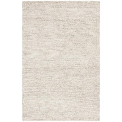 Ebony EBN950 Handmade Tufted Rug - Safavieh