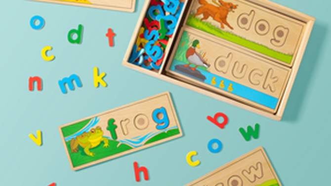 Melissa &#38; Doug See &#38; Spell Wooden Educational Toy With 8 Double-Sided Spelling Boards and 64 Letters, 2 of 18, play video