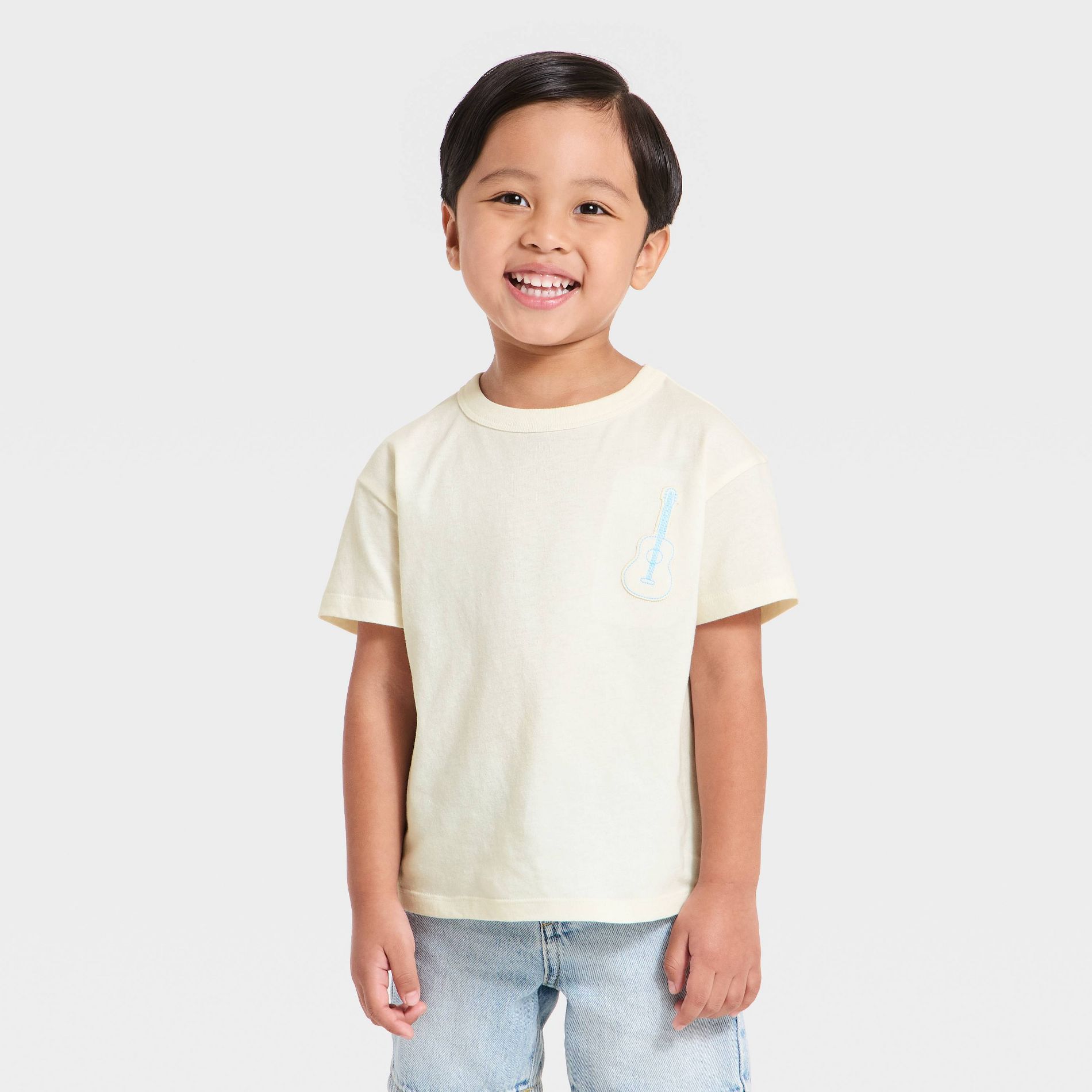 Toddler Boys' Music Festival Short Sleeve Oversized T-Shirt - Cat & Jack™ Cream 5T