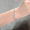 Guili Sterling Silver Rhodium Plated Emerald and Round Cubic Zirconia Cluster Link Bracelet, Elegant and Sparkling for Timeless Style - 3 of 3
