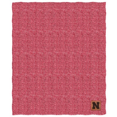 NCAA Nebraska Cornhuskers Two- Tone Sweater Knit Throw Blanket with Faux Leather Logo Patch