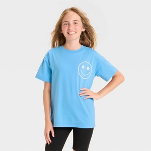 Girls' Short Sleeve Oversized Tulum Graphic T-Shirt - Cat & Jack™ Bright Blue - 1 of 4