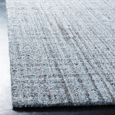 Handmade Black Abstract Wool and Viscose Area Rug