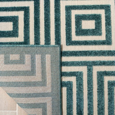 Cottage Elegance 79'' Cream & Turquoise Synthetic Area Rug