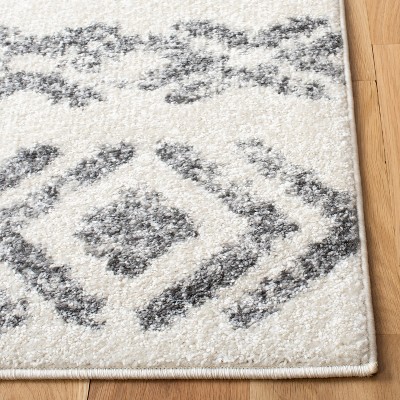Ivory Geometric 5' x 7' Hand-Knotted Easy Care Area Rug