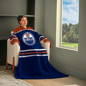 Snuggie Edmonton Oilers  The Original Wearable Blanket with Sleeves & Pockets | Super Soft Fleece | As Seen on TV | Officially Licensed NHL Gear - 1 of 4