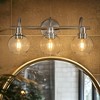 DORESshop 20 in. 3-Light Brushed Nickel Industrial 3-Light Bathroom Vanity Light with Clear Glass Globe Shades Bathroom - 2 of 4