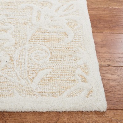 Ivory Hand-Tufted Wool 4' x 6' Area Rug