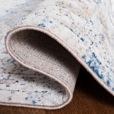 Bristol 4' x 6' Blue and Cream Synthetic Area Rug