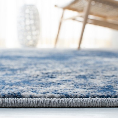 Grey and Navy Abstract 8' x 10' Synthetic Area Rug