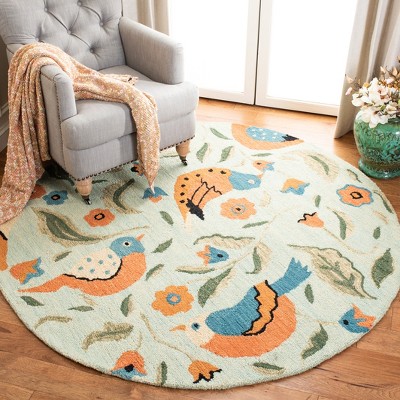 Handmade Round Blue Floral Wool Area Rug