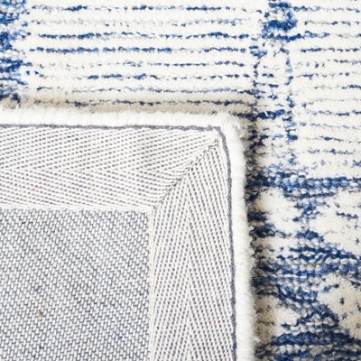 Handmade Blue and Ivory Wool Tufted 4' x 6' Rug