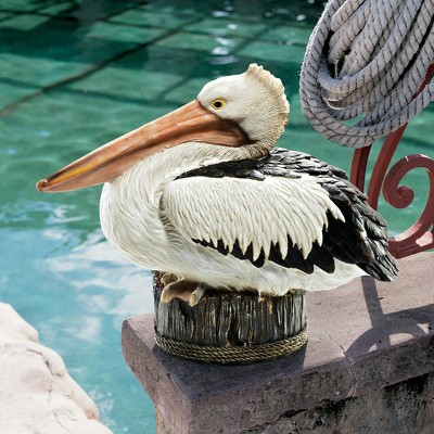 Naturalistic Hand-Painted Resin Pelican Statue on Aged Dock Post