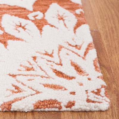 Ivory and Pink Floral Hand Tufted Wool Area Rug 8' x 10'