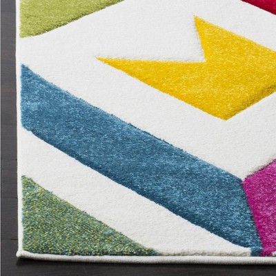 Ivory and Multicolor Geometric 4' x 6' Synthetic Area Rug