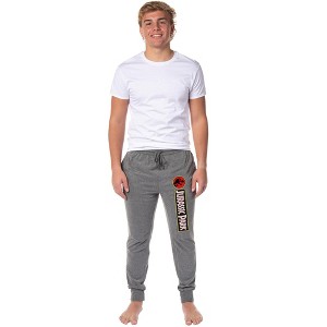 Jurassic Park Mens' Dinosaur Film Movie Title Logo Sleep Jogger Pajama Pants Graphite - 1 of 3