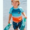 Deux par Deux Boy Printed Swim Trunks Orange Sloths on Navy Blue - 2 of 4