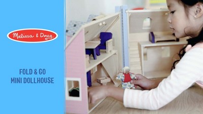 Melissa & Doug Fold And Go Wooden Dollhouse With 2 Dolls And Wooden  Furniture : Target