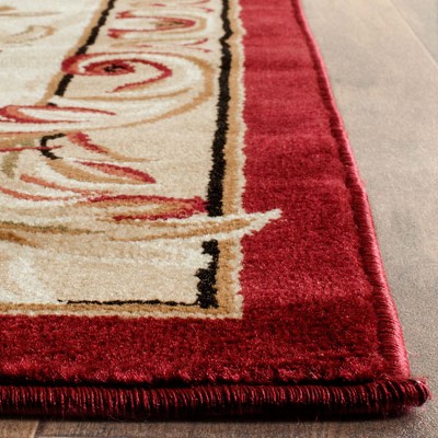 Red and Ivory Floral Synthetic 6' x 9' Area Rug
