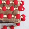 Storied Home Wool Felt Ball Garland with Wood Beads, Red - 4 of 4