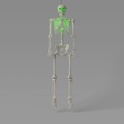 60" Light and Sound Poseable Lifesize Skeleton Halloween Decorative Prop Off-White - Hyde and EEK! Boutique™