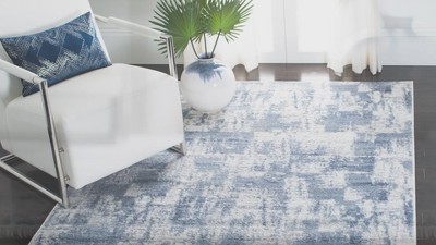 Ivory and Blue Hand-Knotted Round Synthetic Area Rug