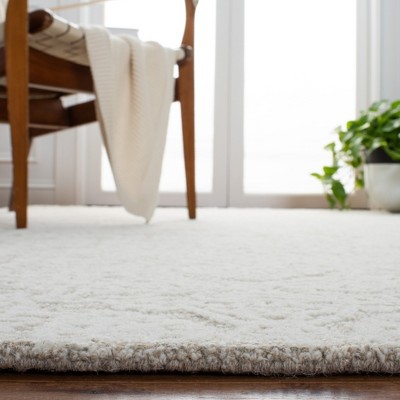 Natural Ivory Hand-Tufted Wool Round Area Rug