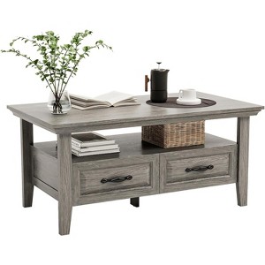 Amada coffee table in the living room, 39.4-inch coffee table with storage space, a modern coffee table with an open display shelf and hidden drawers - 1 of 4