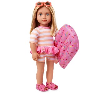 Muñeca Our Generation de 18" con traje de baño y flotador rosa de piscina como accesorio