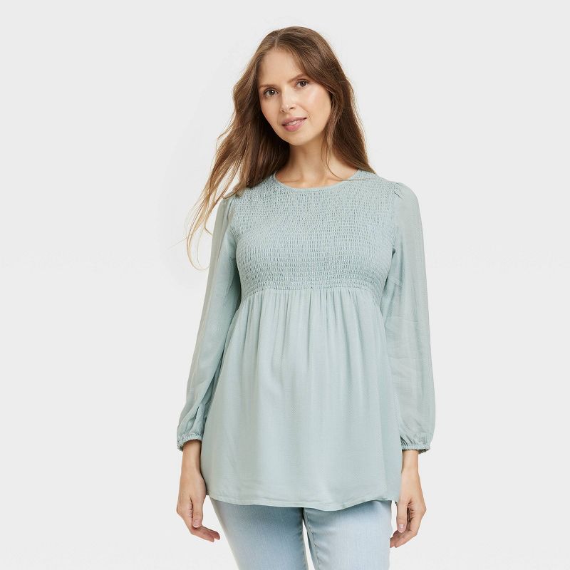 Long Sleeve Smocked Woven Maternity Shirt - Isabel Maternity by Ingrid & Isabel™ Light Blue, 1 of 4