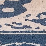 blue cushion/brown wicker