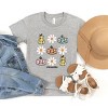 The Juniper Shop SmileyWorld Pumpkin Daisies Chart Youth Short Sleeve Tee - 3 of 4