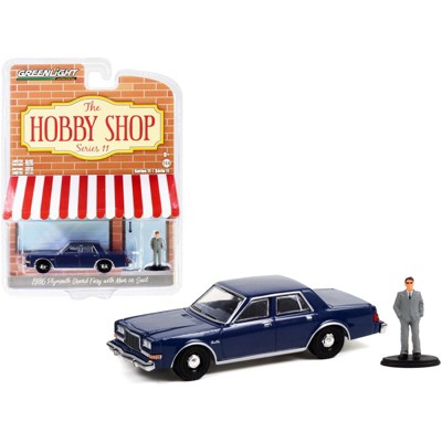 1986 Plymouth Grand Fury Unmarked Police Car Blue & Man in Suit Figurine "The Hobby Shop" 1/64 Diecast Model Car by Greenlight