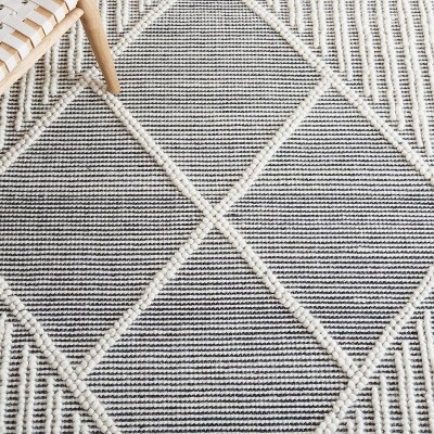 Handwoven Black and Ivory Wool 6' x 9' Area Rug