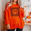 Simply Sage Market Women's Graphic Sweatshirt Halloween Bat Smiley Face - 2 of 2