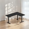 Shaped Electric Standing Desk, 63 x 47.2 inches. A height - adjustable corner desk with power outlets and 2 memory buttons. - 2 of 4