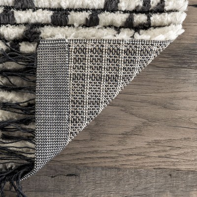 Beige and Ivory 4' x 6' Shag Area Rug with Fringe